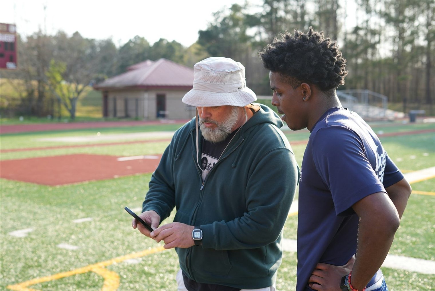 Person receiving a notification on a smartphone, tapping through to a registration page