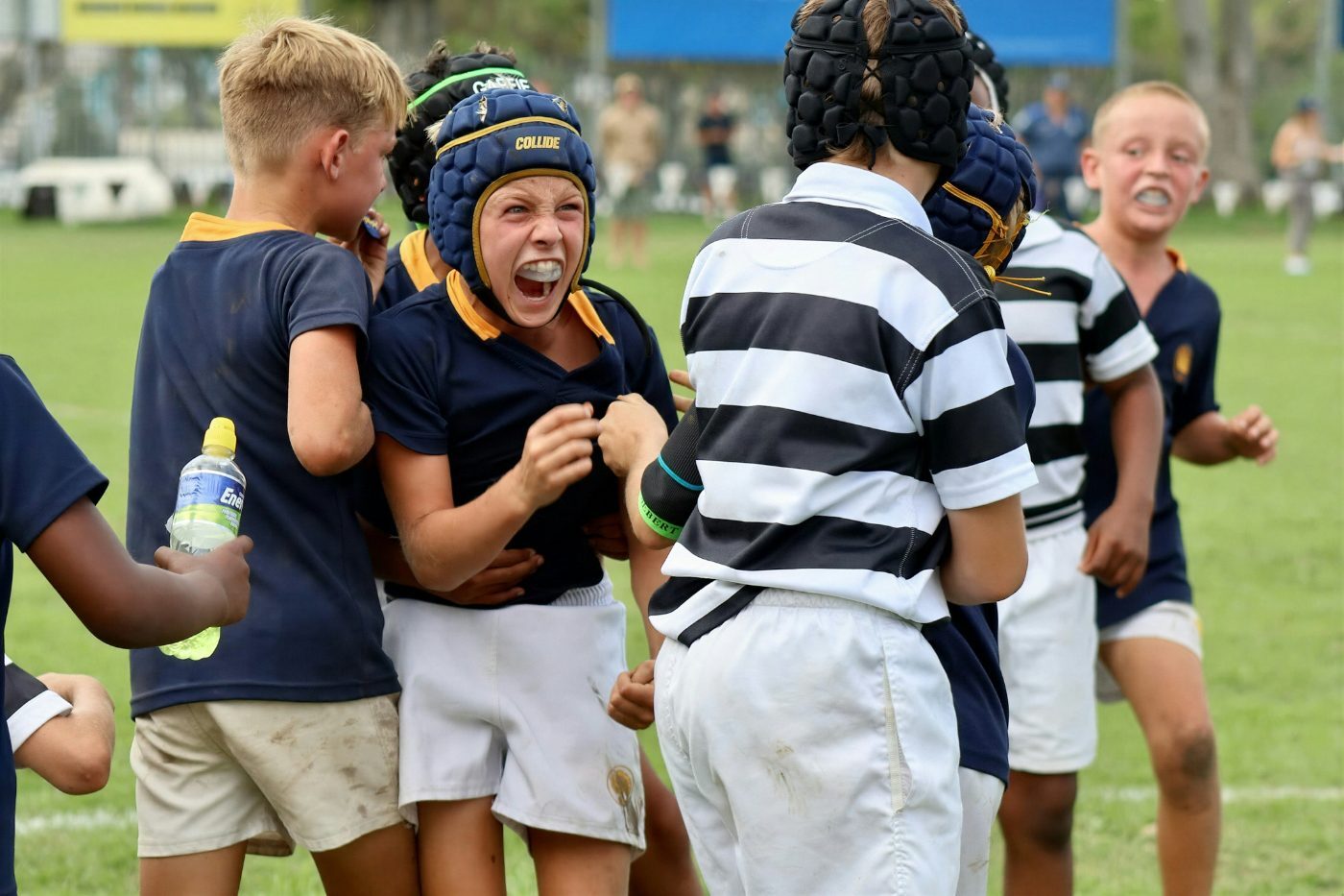 Youth team celebrating together after a game